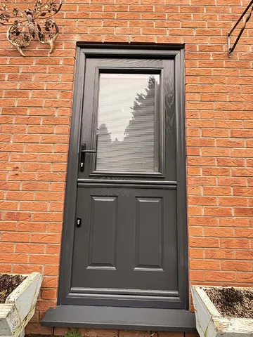 New Anthracite Grey composite stable door fitted to the side entrance
